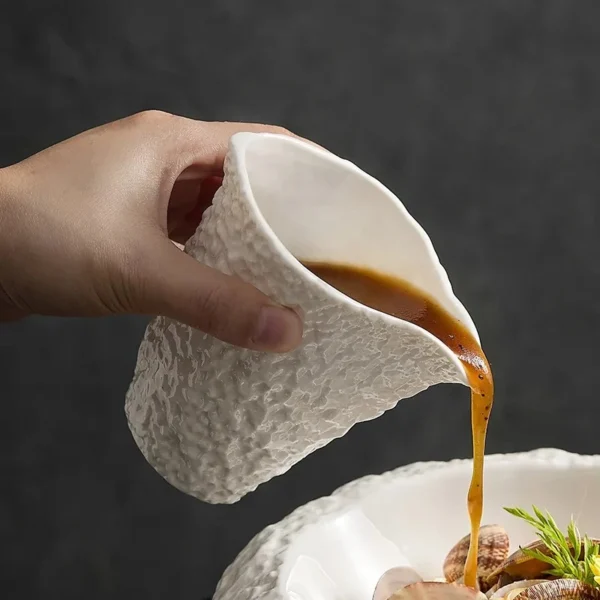 Sa74fec71ba8f488e869c99f16607361c5.webp Ceramic Gravy Boats Restaurant Creative Rock Texture Steak Sauce Pot Milk Cup Household Specialty Pure White Tableware